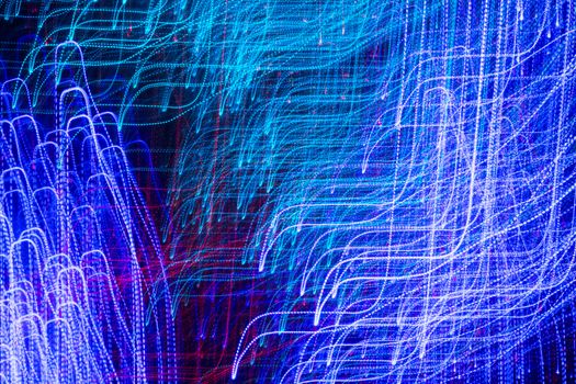 Multicolored abstract background, using motion blur from tunnel lights night