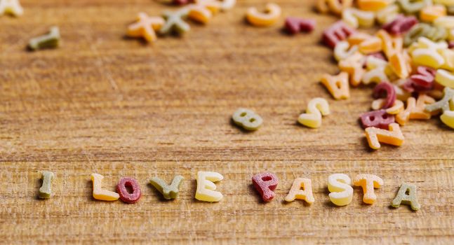 Food, nutrition. Delicious pasta letters