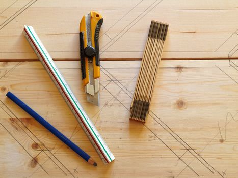 Carpenter carpentry tools on pine wood with space for graphics 