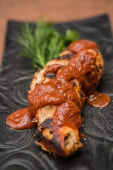 the cut chicken fillet baked in spices and tomato sauce,international kitchen