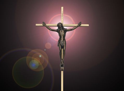 Jesus Christ passion on the cross on black with pink lens flare
