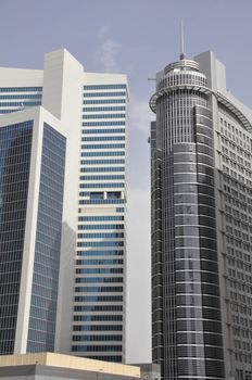 View of Sheikh Zayed Road skyscrapers in Dubai, UAE.  The Sheikh Zayed Road (E11 highway) is home to most of Dubai's skyscrapers, including the Emirates Towers.