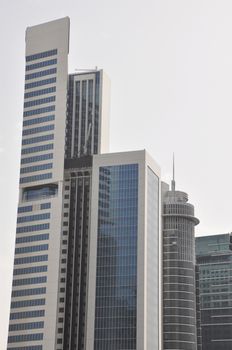 View of Sheikh Zayed Road skyscrapers in Dubai, UAE.  The Sheikh Zayed Road (E11 highway) is home to most of Dubai's skyscrapers, including the Emirates Towers.