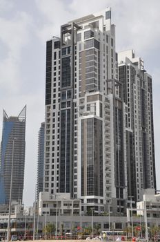 View of Sheikh Zayed Road skyscrapers in Dubai, UAE.  The Sheikh Zayed Road (E11 highway) is home to most of Dubai's skyscrapers, including the Emirates Towers.