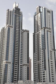 View of Sheikh Zayed Road skyscrapers in Dubai, UAE.  The Sheikh Zayed Road (E11 highway) is home to most of Dubai's skyscrapers, including the Emirates Towers.