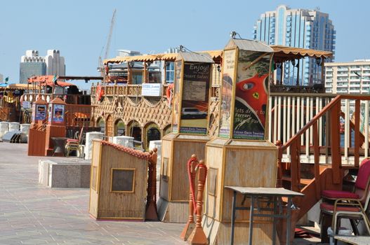 Boats, abras, dhows at Dubai Creek in the UAE. The creek still remains a significant trading hub for goods traded between Iran and The Arabian Peninsula.