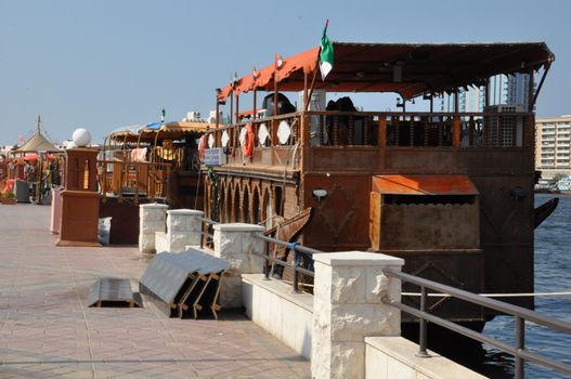 Boats, abras, dhows at Dubai Creek in the UAE. The creek still remains a significant trading hub for goods traded between Iran and The Arabian Peninsula.