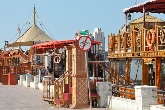 Boats, abras, dhows at Dubai Creek in the UAE. The creek still remains a significant trading hub for goods traded between Iran and The Arabian Peninsula.