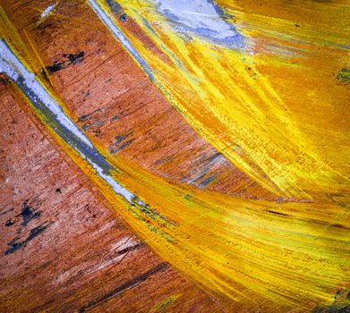 abstract background or texture yellow smudge on oil paints
