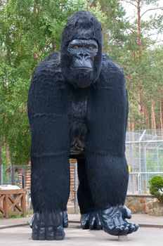 Sculpture big black gorilla around the zoo in Poland.