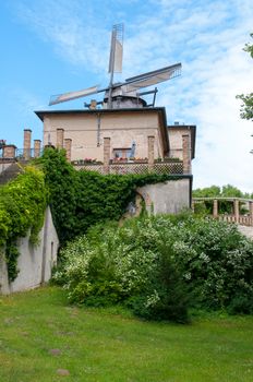 Old wooden windmill. beautiful windmill landscape.