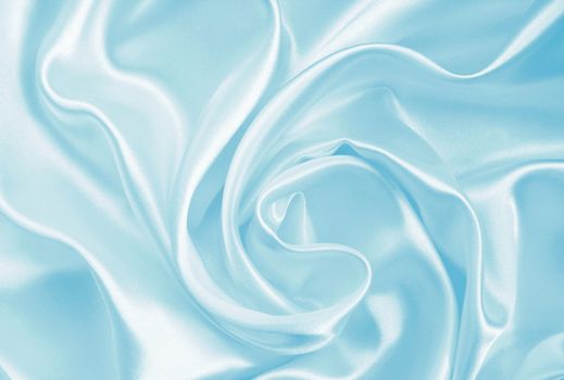 Smooth elegant blue silk or satin can use as background