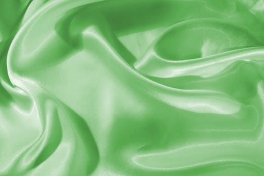 Smooth elegant green silk or satin can use as background 