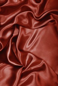 Smooth elegant dark brown chocolate silk or satin can use as background 