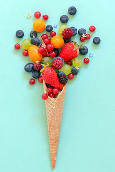 variety of fruits and  waffles cone