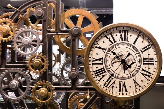 Vintage watch with wooden gears installation