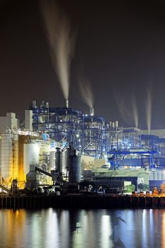 power station at night with smoke, hong kong