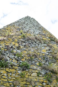 old stone walls from the ruin of an old church on the wild atlantic way in ireland