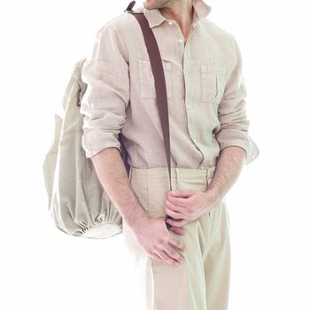 Elegant young handsome man  in white clothing. Studio fashion portrait.