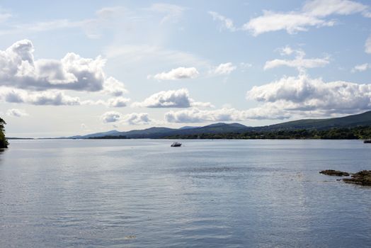 single boat in a quiet bay near kenmare on the wild atlantic way ireland