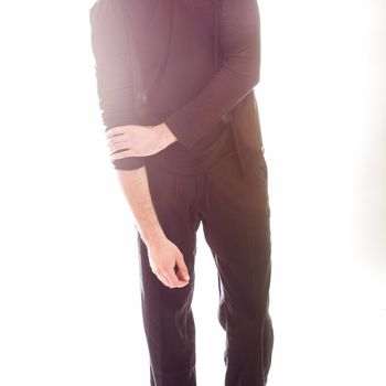 Elegant young handsome man in black clothing. Studio fashion portrait.