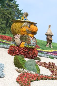 Fabulous figure (made of flowers). Ukraine; Kiev; Singing field.