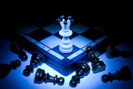 Chess board, queen and pawns. A dark blue art background.