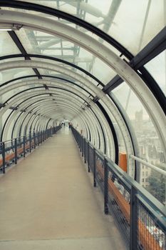 Glass conduit at Pompidou Centre in Paris France. Instagram style filtred image