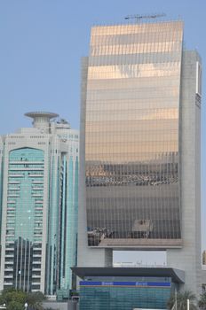 Dubai Creek in Dubai, UAE. The notable buildings along the Deira Creek are Deira Twin Towers, Dubai Creek Tower, National Bank, and Chamber of Commerce.