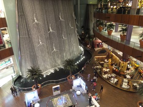 Waterfall at Dubai Mall in Dubai, UAE. The mall is the world's largest shopping mall based on total area and 6th largest by gross leasable area.