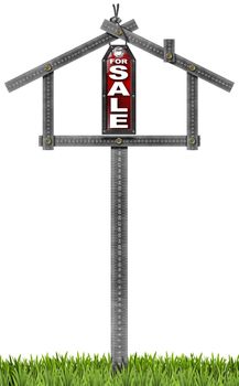 Grey metallic meter ruler in the shape of house and label with text for sale. For sale real estate sign isolated on white background with green grass