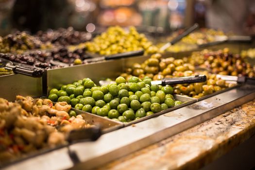 Olives on sale/display in a food market/grocery store