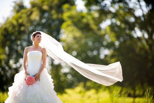 Gorgeous bride on her wedding day (color toned image; shallow DOF)