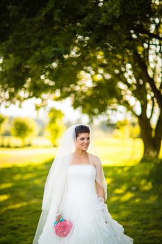 Gorgeous bride on her wedding day (color toned image; shallow DOF)