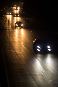 Busy highway at night with cars of commuters going home from work