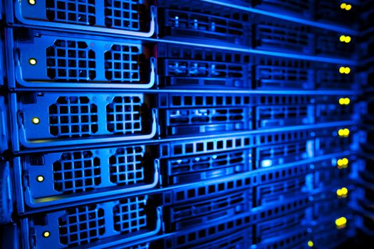 Server rack cluster in a data center (shallow DOF; color toned image)