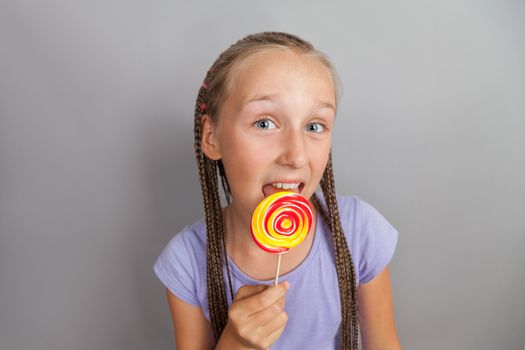 happy girl woman with lollipop