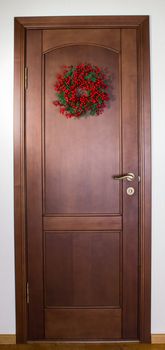 Christmas wreath on wooden door