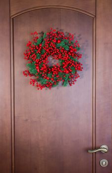 Christmas wreath on wooden door