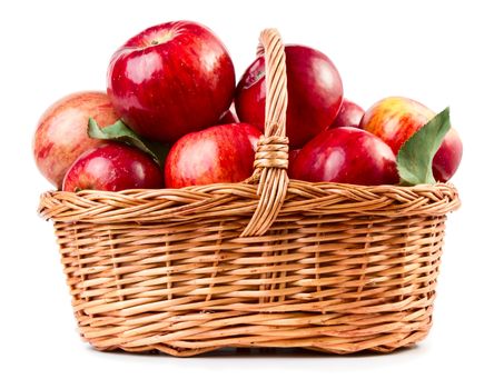 Fresh ripe apples in basket isolated on white background