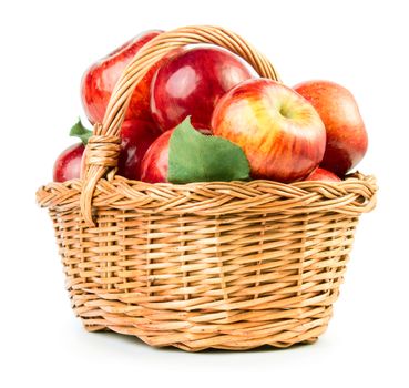 Fresh ripe apples in basket isolated on white background