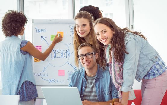 Fashion students working as a team  at the college