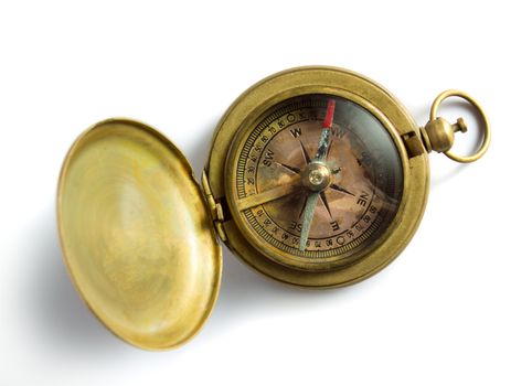 Old vintage compass isolated on white