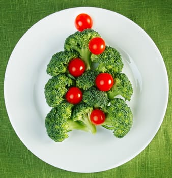 Christmas tree made from broccoli and cherry tomatoes