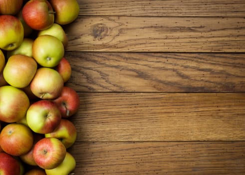 Apples on wooden background