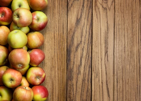 Apples on wooden background