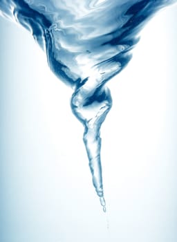 Whirlpool underwater in blue clean transparent water