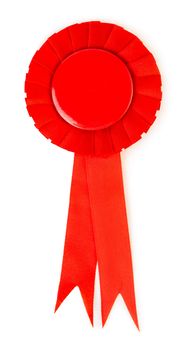 Blank red award winning ribbon rosette isolated on white background