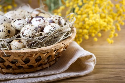 Quail eggs with mimosa brunch on wooden table