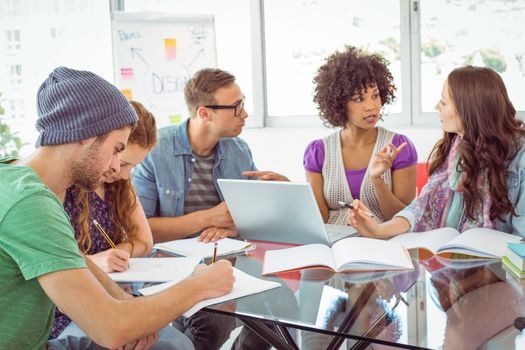 Fashion students working as a team at the college